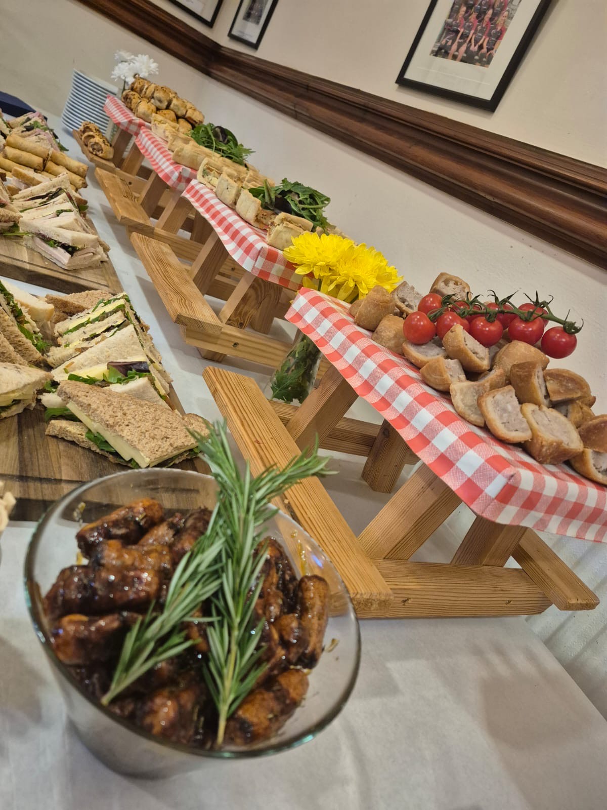 BuffetFood A buffet table featuring sandwiches, sausage rolls and other classic buffet catering