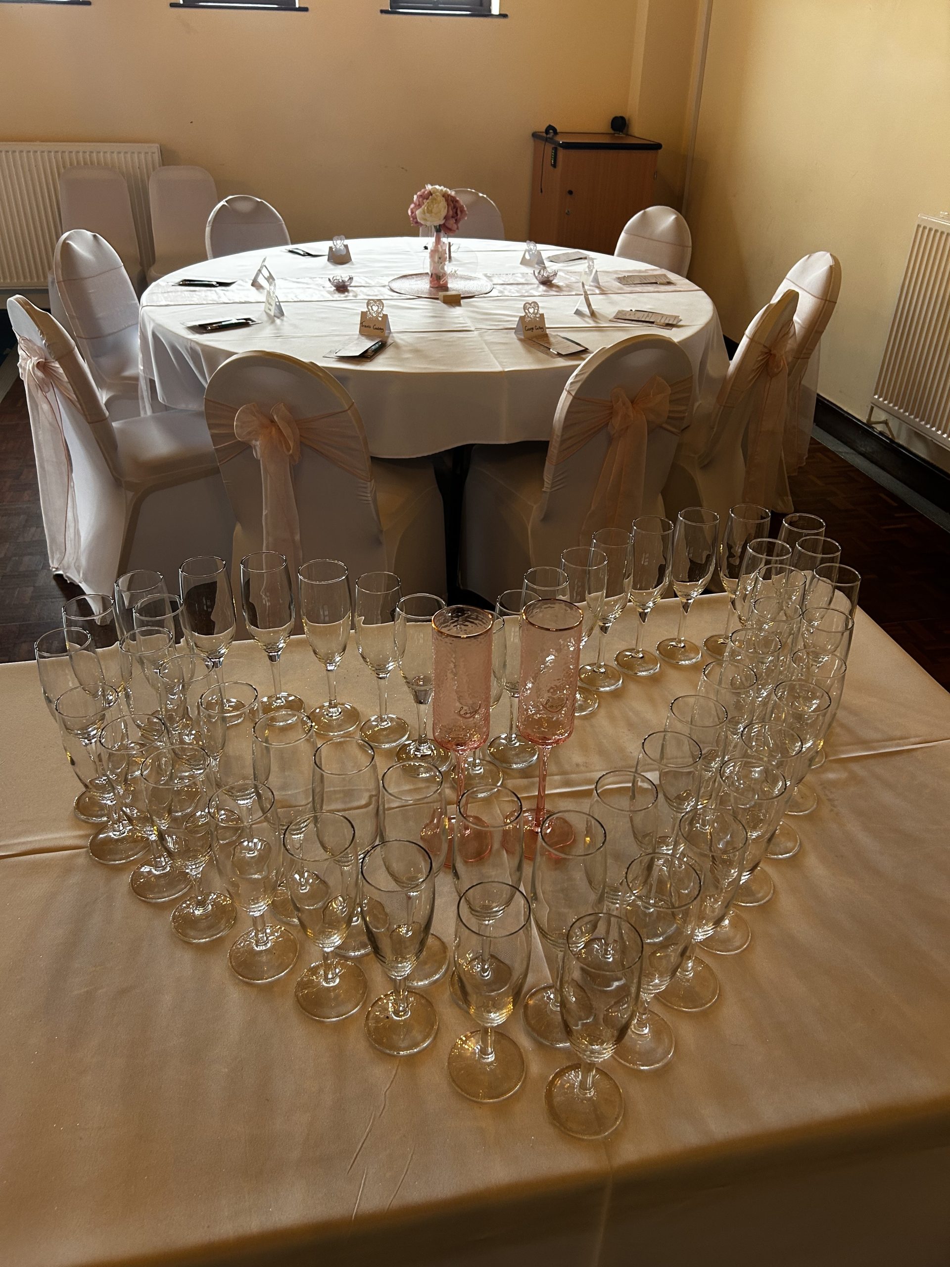 WeddingDecor Champagne glasses arranged into a heart shape